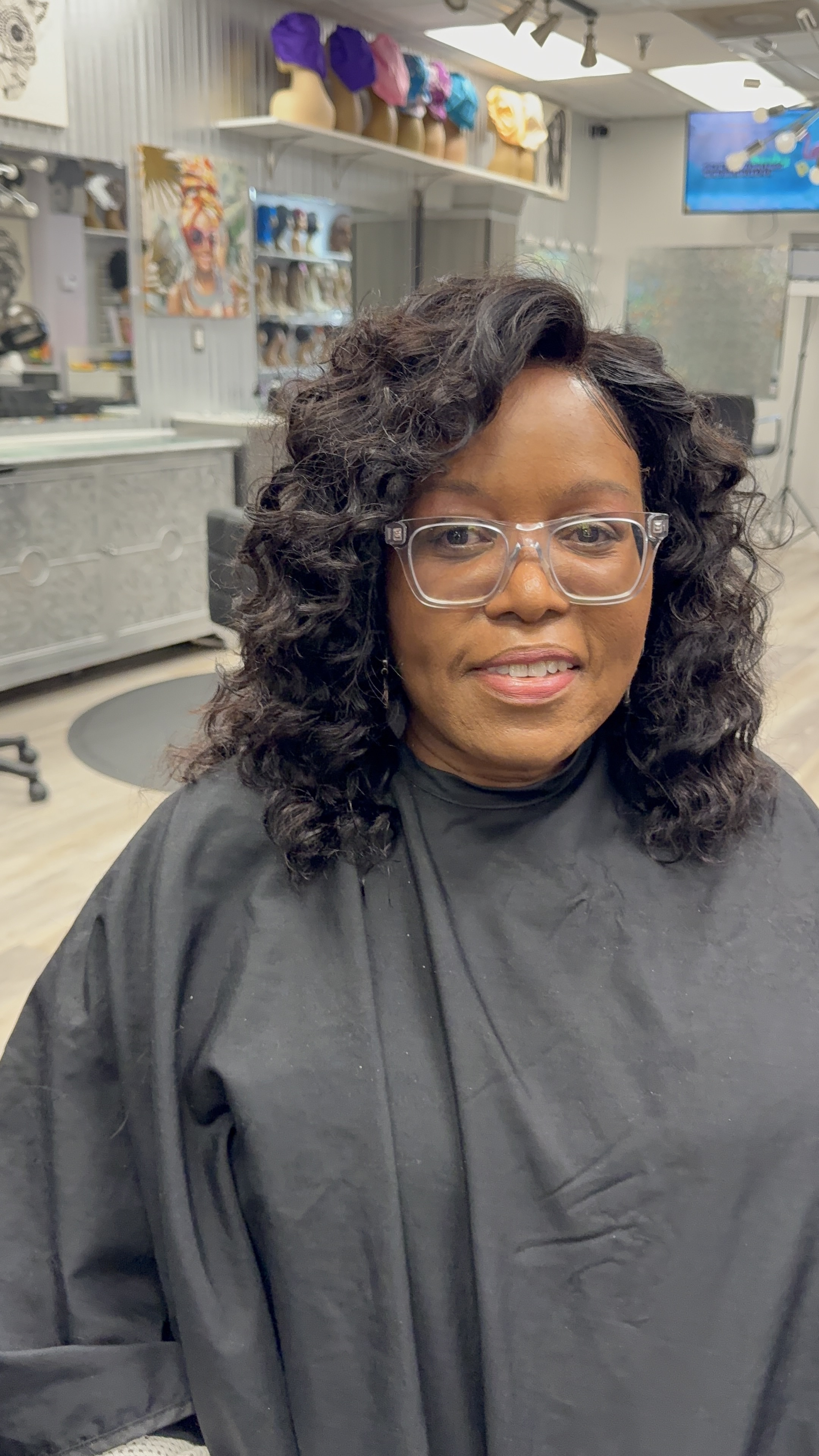 Client with voluminous crochet protective style