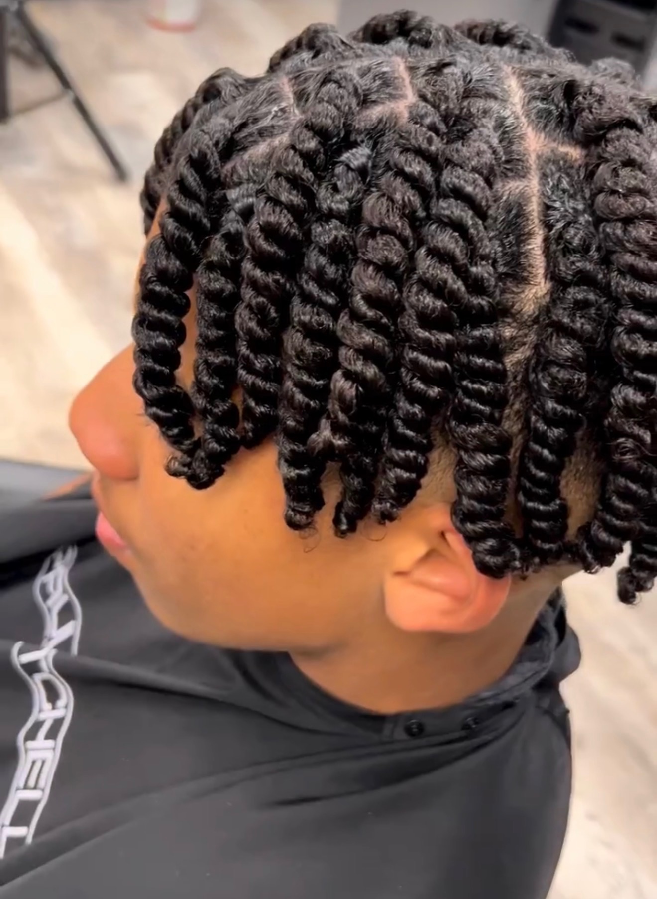 Client with a polished natural hair finish
